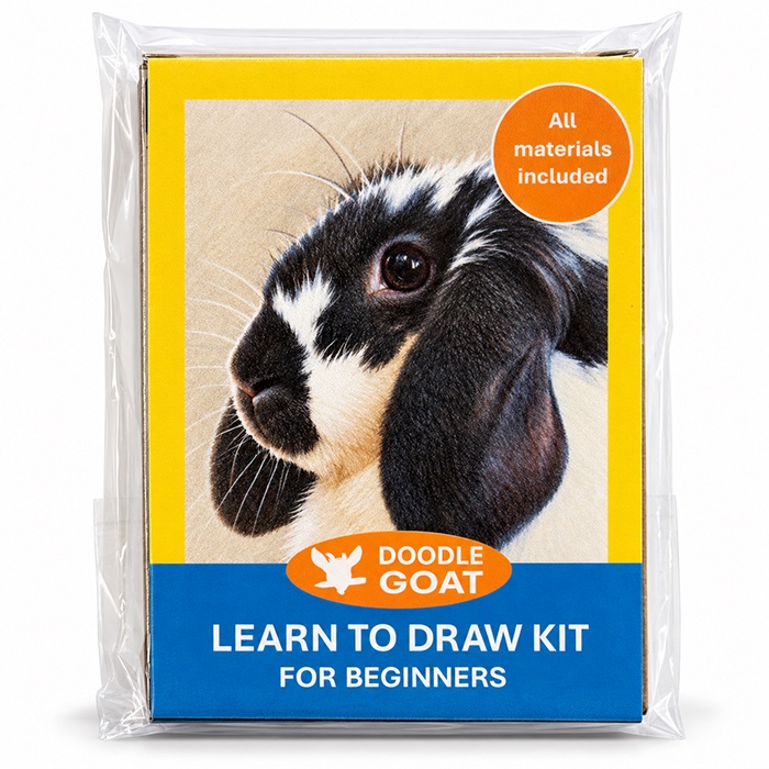 Doodle Goat learn-to-draw kit for beginners in its clear wrapper, with a drawing of a black and white lop-eared rabbit on the front